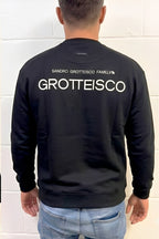 BUZO HOMBRE OVERSIZE CON ESTAMPADO GROTTEISCO